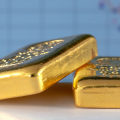 Is it better to buy physical gold or stock?